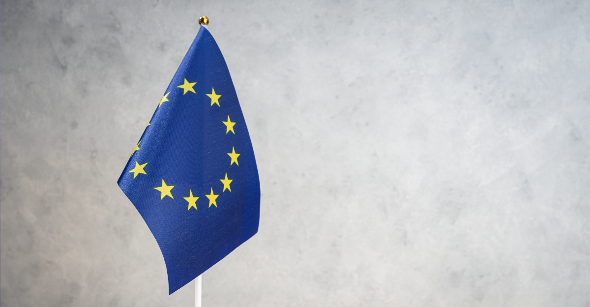 European Union table flag on white textured wall