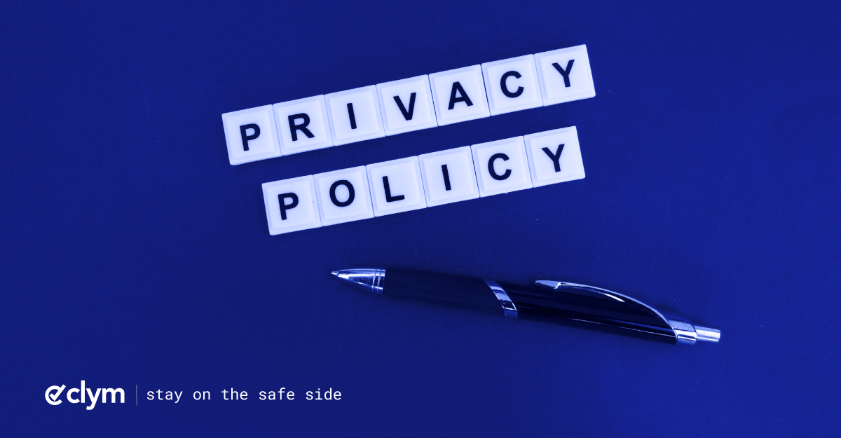 pen with alphabet words privacy policy on dark blue background