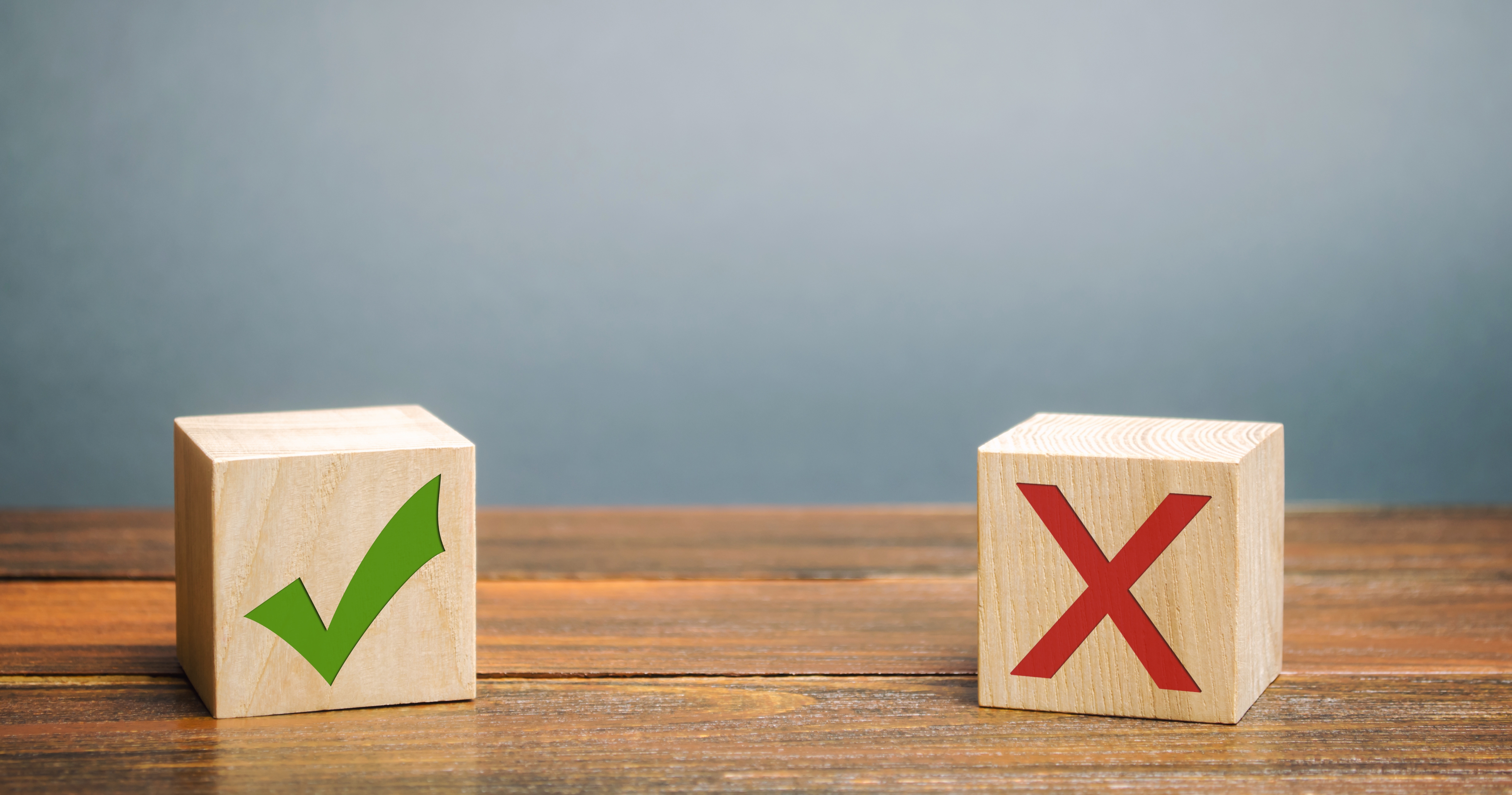 wood blocks with green checkmark and red x on them