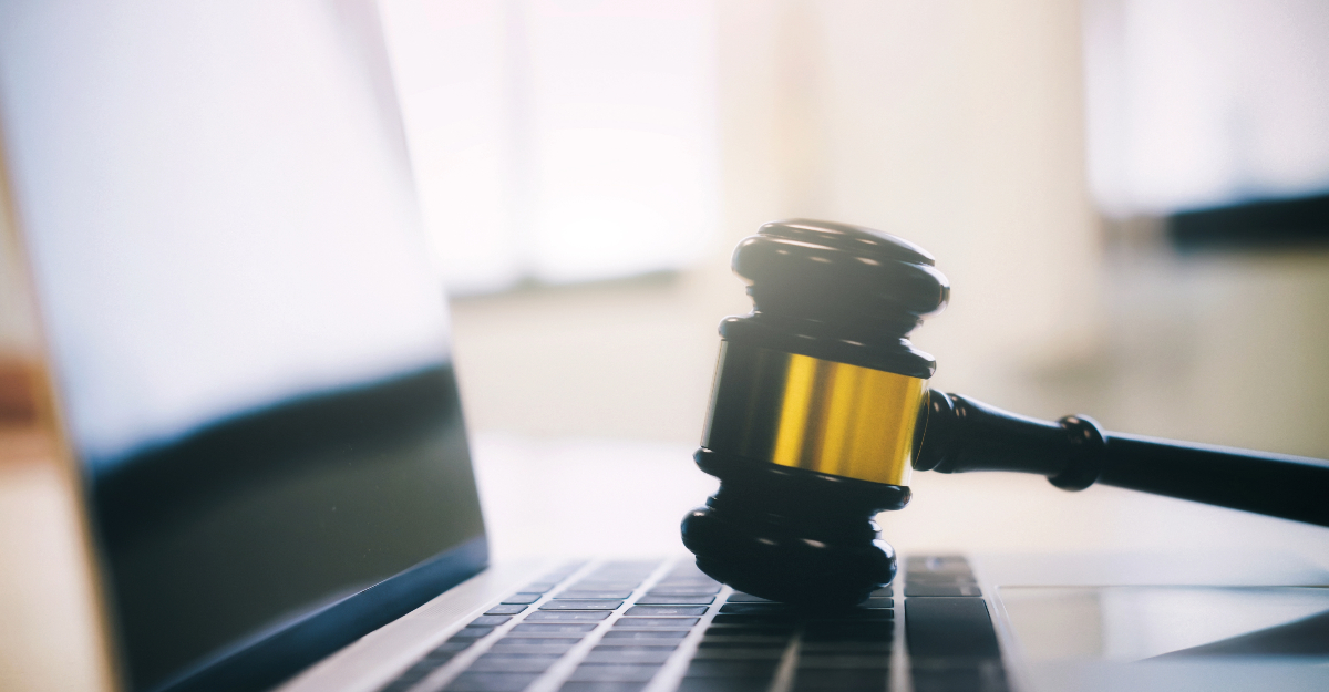 Judge gavel on computer on desk of lawyer